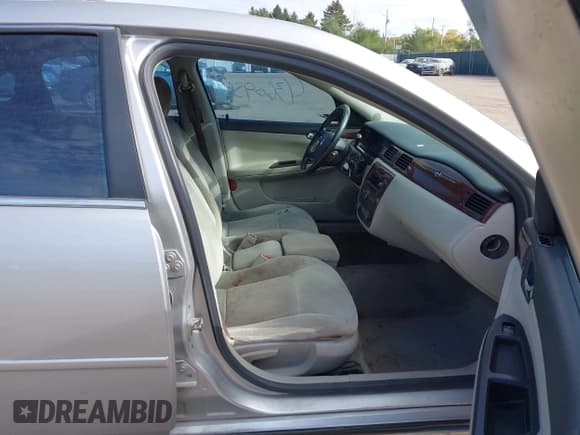 ✅ 2006 Chevrolet Impala LT 3.5L • VIN: 2G1WT58K869265728 • Лот: 43609544. Опубликован ранее на IAAI с пробегом 261 441 миль. Бесплатный доступ к архиву аукционных продаж из США и подробный отчёт об истории автомобиля на DreamBid. Изображение 5.