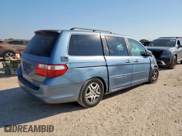 ✅ 2007 Honda Odyssey EX • VIN: 5FNRL38467B126916 • Lot: 85160185. Listed on Copart with 176,493 mi. Free auction sales archive from the USA and detailed vehicle history report at DreamBid. Image 3.