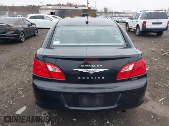 ✅ 2010 Chrysler Sebring Touring • VIN: 1C3CC4FB5AN148335 • Lot: 43754299. Listed on IAAI with 176,503 mi. Free auction sales archive from the USA and detailed vehicle history report at DreamBid. Image 16.