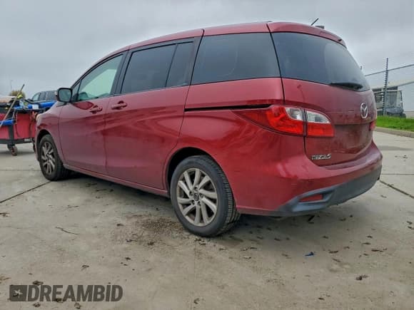 ✅ 2015 Mazda 5 Sport • VIN: JM1CW2BL7F0184828 • Лот: 94140455. Опубликован ранее на Copart с пробегом 94 378 миль. Бесплатный доступ к архиву аукционных продаж из США и подробный отчёт об истории автомобиля на DreamBid. Изображение 2.