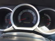 ✅ 2015 Toyota Tacoma PreRunner • VIN: 3TMKU4HN9FM045948 • Lot: 42575327. Listed on IAAI with 67,971 mi. Free auction sales archive from the USA and detailed vehicle history report at DreamBid. Image 7.