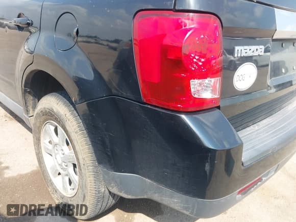 ✅ 2008 Mazda Tribute Grand Touring • VIN: 4F2CZ96168KM01947 • Lot: 43202577. Listed on IAAI with 165,530 mi. Free auction sales archive from the USA and detailed vehicle history report at DreamBid. Image 13.