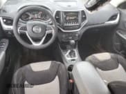 ✅ 2014 Jeep Cherokee Latitude • VIN: 1C4PJLCB7EW323993 • Lot: 85781985. Listed on Copart with 110,256 mi. Free auction sales archive from the USA and detailed vehicle history report at DreamBid. Image 8.