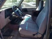 ✅ 1994 Ford Ranger Splash • VIN: 1FTCR14U2RPC47823 • Lot: 62909395. Wystawiony na Copart z przebiegiem 143 566 mil. Bezpłatny archiwum sprzedaży aukcyjnych z USA i szczegółowy raport historii pojazdu na DreamBid. Zdjęcie 7.