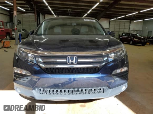 ✅ 2018 Honda Pilot EX-L • VIN: 5FNYF5H52JB006318 • Lot: 82746915. Listed on Copart with 82,611 mi. Free auction sales archive from the USA and detailed vehicle history report at DreamBid. Image 5.