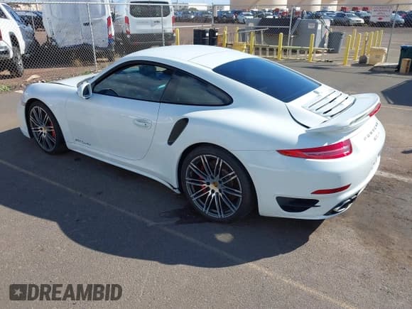 ✅ 2015 Porsche 911 Turbo S • VIN: WP0AD2A98FS167057 • Лот: 41296392. Опубликован ранее на IAAI с пробегом Не указан. Бесплатный доступ к архиву аукционных продаж из США и подробный отчёт об истории автомобиля на DreamBid. Изображение 3.