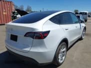 ✅ 2022 Tesla Model Y Long Range • VIN: 7SAYGDEE4NF315356 • Lot: 42895102. Wystawiony na IAAI z przebiegiem 1 057 mil. Bezpłatny archiwum sprzedaży aukcyjnych z USA i szczegółowy raport historii pojazdu na DreamBid. Zdjęcie 4.