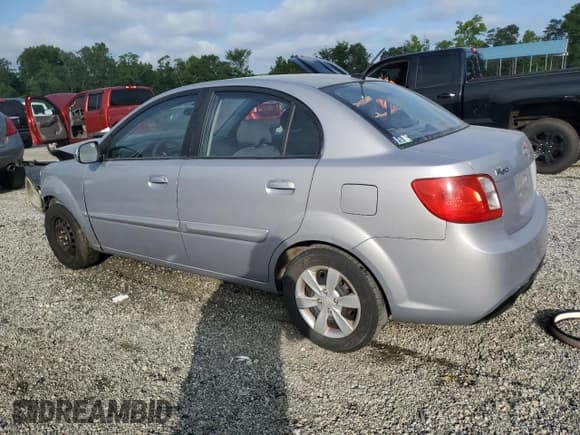 ✅ 2010 Kia Rio LX • VIN: KNADH4A36A6656371 • Lot: 64605635. Listed on Copart with 147,022 mi. Free auction sales archive from the USA and detailed vehicle history report at DreamBid. Image 2.