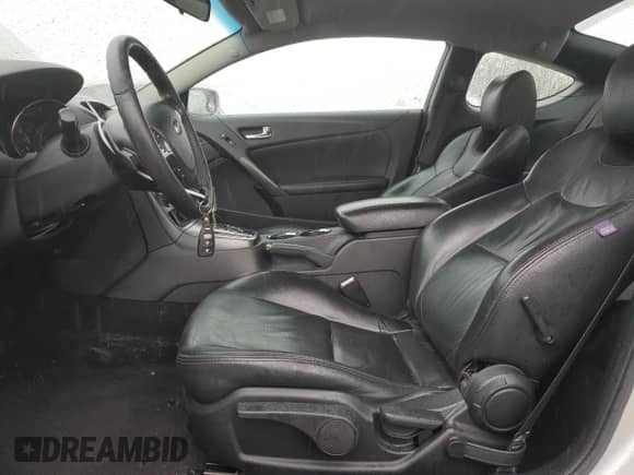 2012 Hyundai Genesis Coupe 2.0T z VIN KMHHT6KD2CU074526, wystawiony jako Copart lot #42262575 z przebiegiem 148 710 mil mil oraz Szkoda całkowita • Salvage title. Historia ofert i sprzedaży dostępna na DreamBid. Obrazek 7.