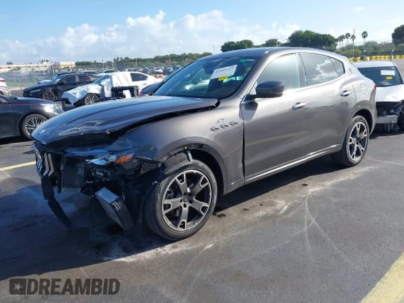 ✅ 2023 Maserati Levante GT • VIN: ZN661XUA1PX428680 • Lot: 43365515. Listed on IAAI with 18,623 mi. Free auction sales archive from the USA and detailed vehicle history report at DreamBid. Image 2.