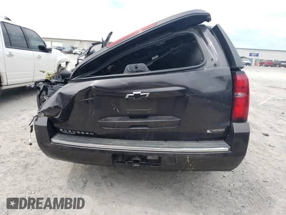 2017 Chevrolet Suburban Premier z VIN 1GNSCJKC7HR123032, wystawiony jako Copart lot #70243104 z przebiegiem Nie podano mil oraz Szkoda całkowita • Salvage title. Historia ofert i sprzedaży dostępna na DreamBid. Obrazek 6.