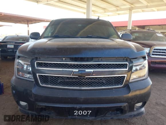 ✅ 2007 Chevrolet Suburban LTZ • VIN: 3GNFC160X7G124546 • Lot: 42062201. Listed on IAAI with 242,514 mi. Free auction sales archive from the USA and detailed vehicle history report at DreamBid. Image 6.