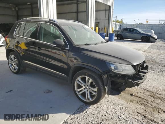 ✅ 2012 Volkswagen Tiguan S • VIN: WVGBV7AX6CW562562 • Lot: 87060975. Listed on Copart with 179,456 mi. Free auction sales archive from the USA and detailed vehicle history report at DreamBid. Image 4.