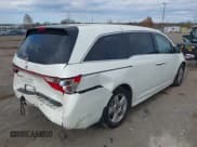 ✅ 2012 Honda Odyssey Touring • VIN: 5FNRL5H9XCB126080 • Lot: 43686755. Listed on IAAI with 116,383 mi. Free auction sales archive from the USA and detailed vehicle history report at DreamBid. Image 4.