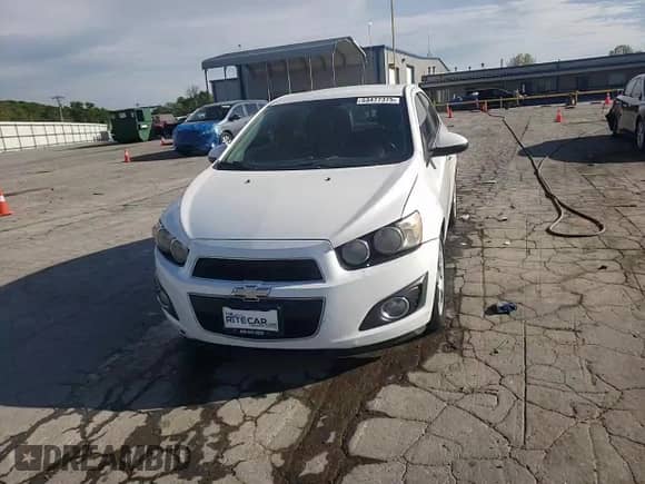 2012 Chevrolet Sonic LTZ with VIN 1G1JE5SH7C4191542, listed as a Copart auction lot 53477375 with 206,562 mi miles and Salvage title. Bid and sale history available at DreamBid. Image 13.