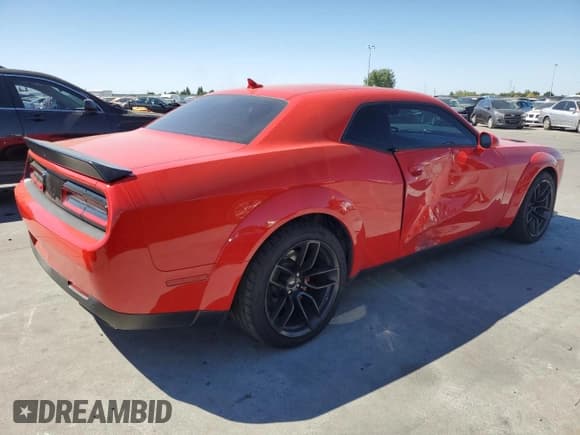 ✅ 2022 Dodge Challenger R/T Scat Pack Widebody • VIN: 2C3CDZFJ3NH109033 • Lot: 70006854. Wystawiony na Copart z przebiegiem 38 605 mil. Bezpłatny archiwum sprzedaży aukcyjnych z USA i szczegółowy raport historii pojazdu na DreamBid. Zdjęcie 3.
