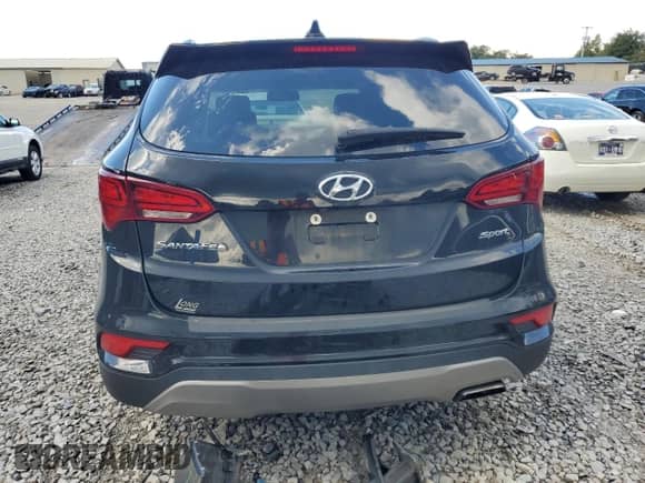 2017 Hyundai Santa Fe 2.4L z VIN 5NMZU3LB2HH041686, wystawiony jako Copart lot #84218665 z przebiegiem 146 906 mil mil oraz Czysty tytuł • Clean title. Historia ofert i sprzedaży dostępna na DreamBid. Obrazek 6.