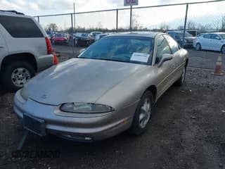 ✅ 1995 Oldsmobile Aurora • VIN: 1G3GR62C5S4115445 • Lot: 41804720. Wystawiony na IAAI z przebiegiem 104 285 mil. Bezpłatny archiwum sprzedaży aukcyjnych z USA i szczegółowy raport historii pojazdu na DreamBid. Zdjęcie 2.