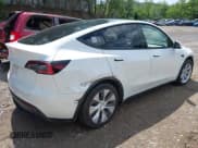 ✅ 2021 Tesla Model Y Standard Range • VIN: 5YJYGDEDXMF109655 • Lot: 42644656. Listed on IAAI with 40,818 mi. Free auction sales archive from the USA and detailed vehicle history report at DreamBid. Image 4.