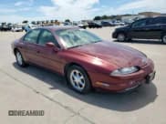 ✅ 1999 Oldsmobile Aurora • VIN: 1G3GR62C0X4109351 • Lot: 66501485. Listed on Copart with 83,131 mi. Free auction sales archive from the USA and detailed vehicle history report at DreamBid. Image 4.