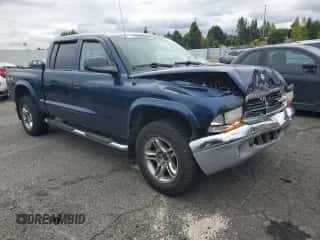 2004 Dodge Dakota SLT z VIN 1D7HG48N94S688652, wystawiony jako Copart lot #71942564 z przebiegiem 141 942 mil mil oraz Szkoda całkowita • Salvage title. Historia ofert i sprzedaży dostępna na DreamBid. Obrazek 4.