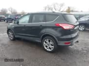 ✅ 2015 Ford Escape Titanium • VIN: 1FMCU9J9XFUB77087 • Lot: 43771373. Listed on IAAI with 95,650 mi. Free auction sales archive from the USA and detailed vehicle history report at DreamBid. Image 3.