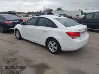 ✅ 2014 Chevrolet Cruze 1LT • VIN: 1G1PC5SB2E7401106 • Lot: 43573350. Listed on IAAI with 108,498 mi. Free auction sales archive from the USA and detailed vehicle history report at DreamBid. Image 3.