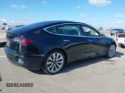 ✅ 2018 Tesla Model 3 Long Range Battery • VIN: 5YJ3E1EA8JF169904 • Lot: 43629032. Listed on IAAI with 90,632 mi. Free auction sales archive from the USA and detailed vehicle history report at DreamBid. Image 4.