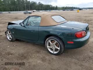 ✅ 2001 Mazda MX-5 Miata • VIN: JM1NB353310210873 • Lot: 71154744. Listed on Copart with 52,372 mi. Free auction sales archive from the USA and detailed vehicle history report at DreamBid. Image 2.