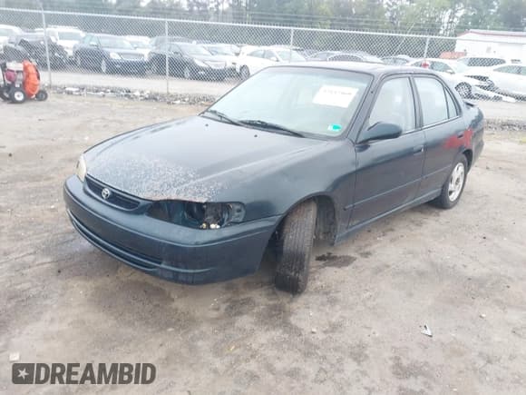 ✅ 1999 Toyota Corolla VE • VIN: 2T1BR12E4XC124432 • Лот: 42842460. Опубликован ранее на IAAI с пробегом 286 745 миль. Бесплатный доступ к архиву аукционных продаж из США и подробный отчёт об истории автомобиля на DreamBid. Изображение 2.