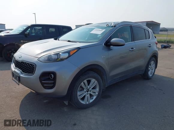 ✅ 2019 Kia Sportage LX • VIN: KNDPMCACXK7597942 • Lot: 42891621. Wystawiony na IAAI z przebiegiem 61 218 mil. Bezpłatny archiwum sprzedaży aukcyjnych z USA i szczegółowy raport historii pojazdu na DreamBid. Zdjęcie 17.