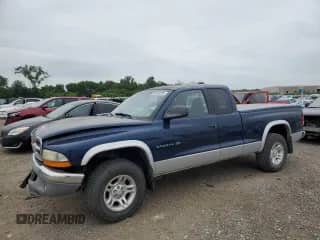 2001 Dodge Dakota Sport with VIN 1B7GG22NX1S207838, listed as a Copart auction lot 65409635 with 142,790 mi miles and Salvage title. Bid and sale history available at DreamBid. Image 1.