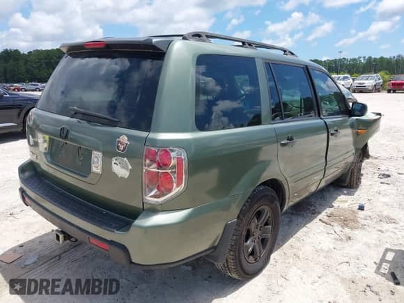 2007 Honda Pilot LX with VIN 5FNYF28167B023921, listed as a IAAI auction lot 42727822 with 177,088 mi miles and . Bid and sale history available at DreamBid. Image 4.