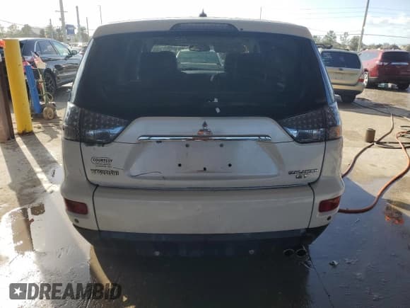 ✅ 2012 Mitsubishi Outlander GT • VIN: JA4JT5AX4CU005293 • Lot: 77539064. Wystawiony na Copart z przebiegiem 140 951 mil. Bezpłatny archiwum sprzedaży aukcyjnych z USA i szczegółowy raport historii pojazdu na DreamBid. Zdjęcie 6.