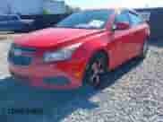 2014 Chevrolet Cruze 1LT z VIN 1G1PD5SB2E7269400, wystawiony jako IAAI lot #43599614 z przebiegiem 195 578 mil mil oraz . Historia ofert i sprzedaży dostępna na DreamBid. Obrazek 2.