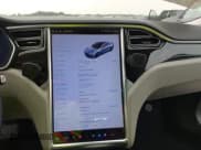 ✅ 2014 Tesla Model S 60 • VIN: 5YJSA1S13EFP63883 • Lot: 42295100. Listed on IAAI with 143,734 mi. Free auction sales archive from the USA and detailed vehicle history report at DreamBid. Image 18.