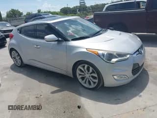 ✅ 2012 Hyundai Veloster w/Gray Int • VIN: KMHTC6ADXCU028115 • Lot: 42361550. Listed on IAAI with 118,920 mi. Free auction sales archive from the USA and detailed vehicle history report at DreamBid. Image 1.