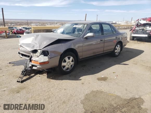 ✅ 1994 Toyota Camry LE • VIN: JT2GK12E2R0050878 • Лот: 46878005. Опубликован ранее на Copart с пробегом 152 211 миль. Бесплатный доступ к архиву аукционных продаж из США и подробный отчёт об истории автомобиля на DreamBid. Изображение 1.