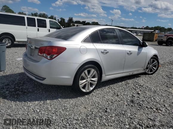 ✅ 2015 Chevrolet Cruze LTZ • VIN: 1G1PG5SB4F7183935 • Lot: 84209825. Listed on Copart with 132,199 mi. Free auction sales archive from the USA and detailed vehicle history report at DreamBid. Image 3.