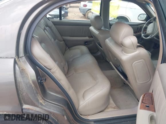 ✅ 2000 Buick Park Avenue • VIN: 1G4CW52K6Y4201182 • Лот: 42537631. Опубликован ранее на IAAI с пробегом 136 597 миль. Бесплатный доступ к архиву аукционных продаж из США и подробный отчёт об истории автомобиля на DreamBid. Изображение 8.