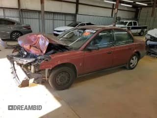 1999 Saturn SL z VIN 1G8ZF5281XZ273180, wystawiony jako Copart lot #86843915 z przebiegiem Nie podano mil oraz Szkoda całkowita • Salvage title. Historia ofert i sprzedaży dostępna na DreamBid. Obrazek 1.