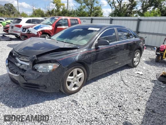 2012 Chevrolet Malibu 1LS z VIN 1G1ZB5E0XCF156340, wystawiony jako Copart lot #86523055 z przebiegiem 121 189 mil mil oraz Szkoda całkowita • Salvage title. Historia ofert i sprzedaży dostępna na DreamBid. Obrazek 1.