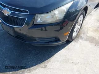 ✅ 2012 Chevrolet Cruze LS • VIN: 1G1PD5SH0C7103586 • Lot: 43312571. Listed on IAAI with 157,108 mi. Free auction sales archive from the USA and detailed vehicle history report at DreamBid. Image 6.