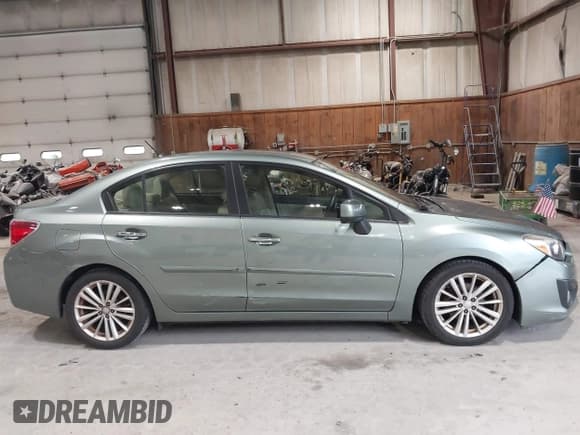 ✅ 2014 Subaru Impreza Limited • VIN: JF1GJAG69EH021682 • Lot: 42514563. Wystawiony na IAAI z przebiegiem 73 442 mil. Bezpłatny archiwum sprzedaży aukcyjnych z USA i szczegółowy raport historii pojazdu na DreamBid. Zdjęcie 13.