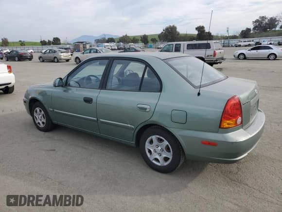 2004 Hyundai Accent GL с VIN KMHCG45C14U540938, выставлен на аукционе Copart как лот 46701935 с пробегом 71 891 миль миль и Списание • Salvage title. История ставок и продаж доступна на DreamBid. Изображение 2.