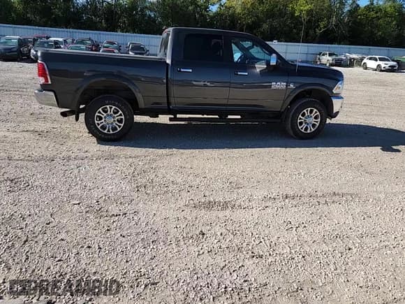 ✅ 2017 Ram 2500 Laramie • VIN: 3C6UR5FL6HG581170 • Lot: 68910205. Listed on Copart with 126,544 mi. Free auction sales archive from the USA and detailed vehicle history report at DreamBid. Image 13.