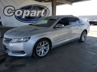 2018 Chevrolet Impala Premier z VIN 2G1125S3XJ9148658, wystawiony jako Copart lot #70948825 z przebiegiem 133 512 mil mil oraz Szkoda całkowita • Salvage title. Historia ofert i sprzedaży dostępna na DreamBid. Obrazek 1.