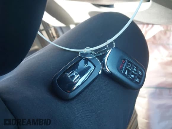 ✅ 2025 Honda Odyssey Touring • VIN: 5FNRL6H84SB020560 • Lot: 43591040. Listed on IAAI with 5,281 mi. Free auction sales archive from the USA and detailed vehicle history report at DreamBid. Image 11.