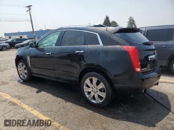 ✅ 2015 Cadillac SRX Premium Collection • VIN: 3GYFNGE3XFS573121 • Lot: 64599105. Wystawiony na Copart z przebiegiem 105 369 mil. Bezpłatny archiwum sprzedaży aukcyjnych z USA i szczegółowy raport historii pojazdu na DreamBid. Zdjęcie 2.
