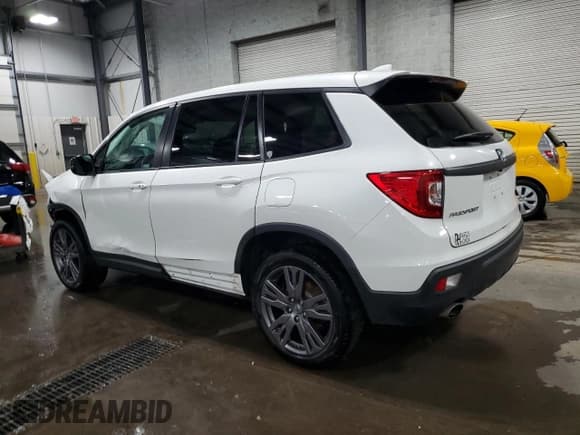 ✅ 2020 Honda Passport EX-L • VIN: 5FNYF8H59LB016607 • Lot: 69246785. Listed on Copart with 84,042 mi. Free auction sales archive from the USA and detailed vehicle history report at DreamBid. Image 2.